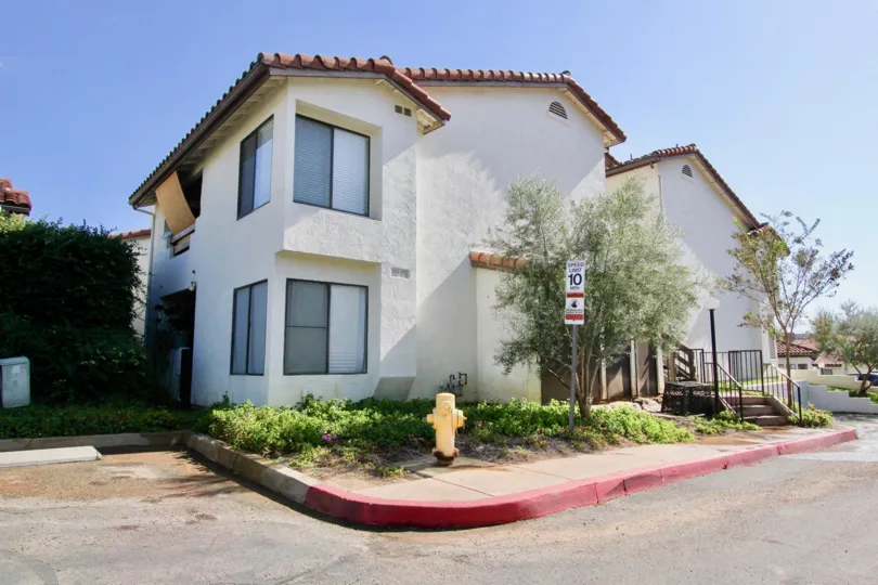 A sunny day in the Adobe Hills showing a very beautiful mansion.