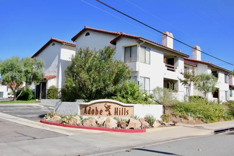 The sign for Adobe Hills in Escondido, California, on a sunny day
