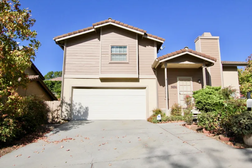 Avocado Estates  , Escondido , California, mauve building, plants