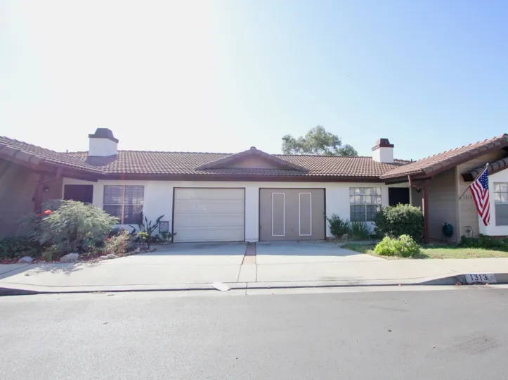 Single story home near driveway at Avocado Estates in Escondido California