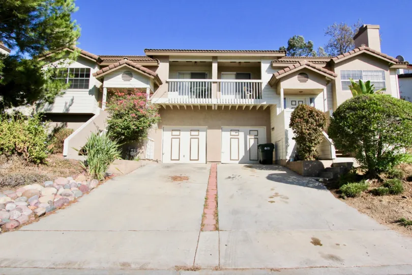 Outside view of a white side by site mirrored unit from Avocado Estates of Escondido, California