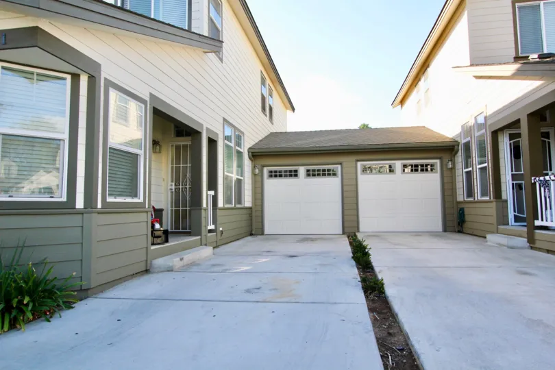 Driveways leading up to garage doors at Brotherton Square in Escondido California