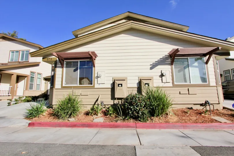 Brotherton Square community Escondido California windows vegas landscaping shrubbery covered entry windows