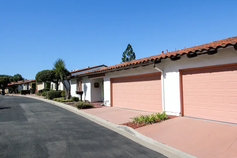 the Buena Ventura complex with pink garages located in Escondido CA