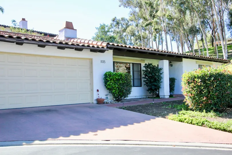 Home with driveway and yard at Buena Venture in Escondido California