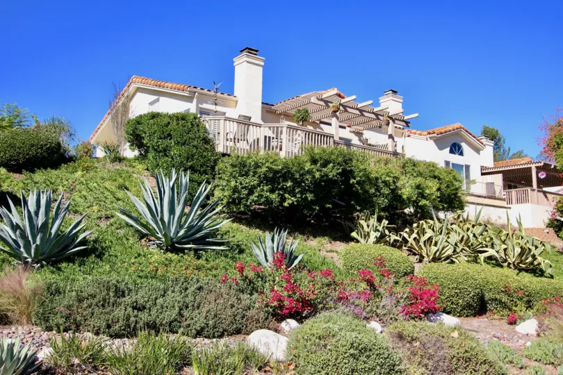 Overlook the beautiful landscaping from your deck at Castle Creek Villas.