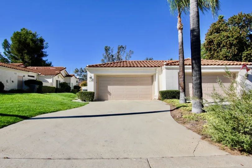 Long driveway leading up to parking garages at Castle Creek Villas in Escondido California