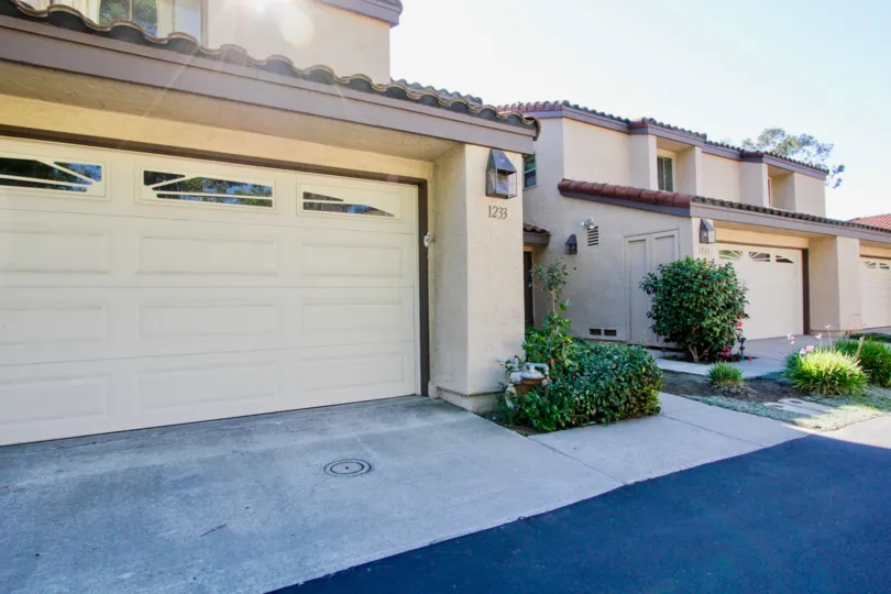Escondido Country Club Terrace, California neighboring houses with clean landscaping and