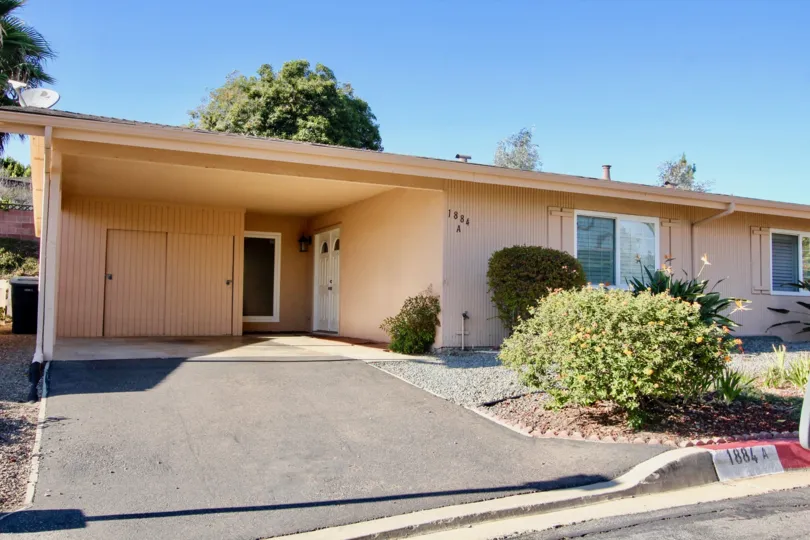 Driveway leading to single story housing at Fairway Park in Escondido California