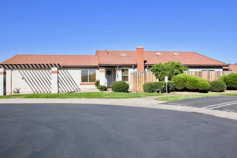 One Story Ranch Style House with Bushes in Heather Glen of Escondido, California