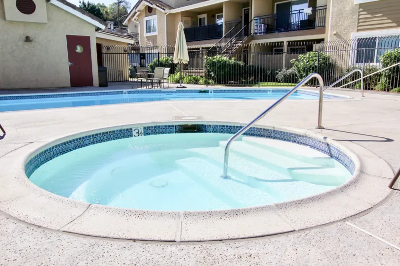 Play in the pool and relax in the hot tub at Heritage at Canyon Point.