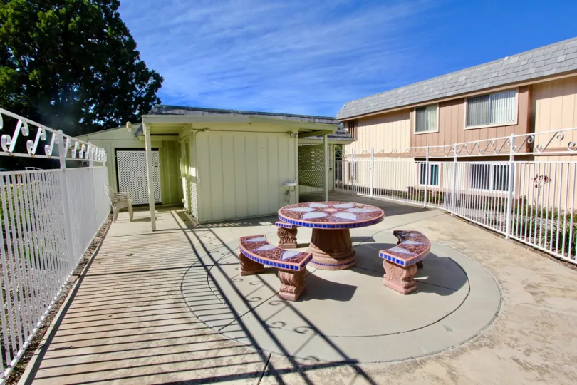 Picnic area next to residential units at Hidden Meadows Condos in Escondido California