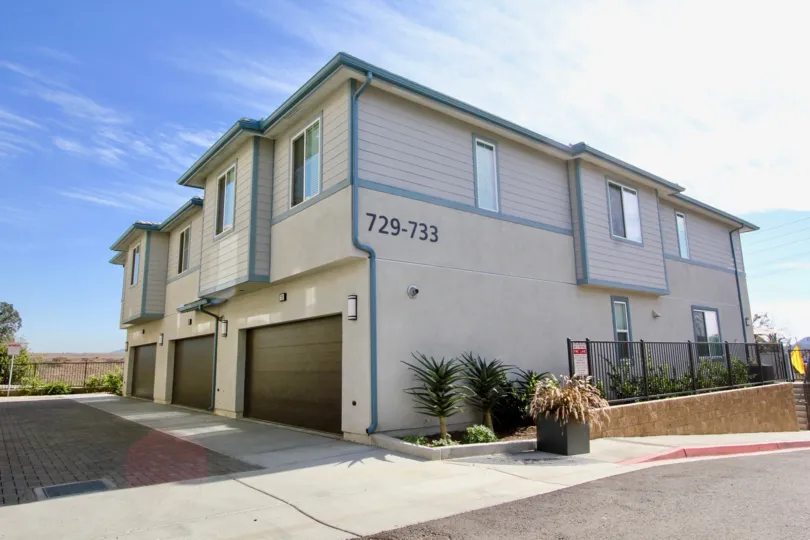 Outside view of units 729-733 of Level Fifteen in Escondido, CA on a sunny day