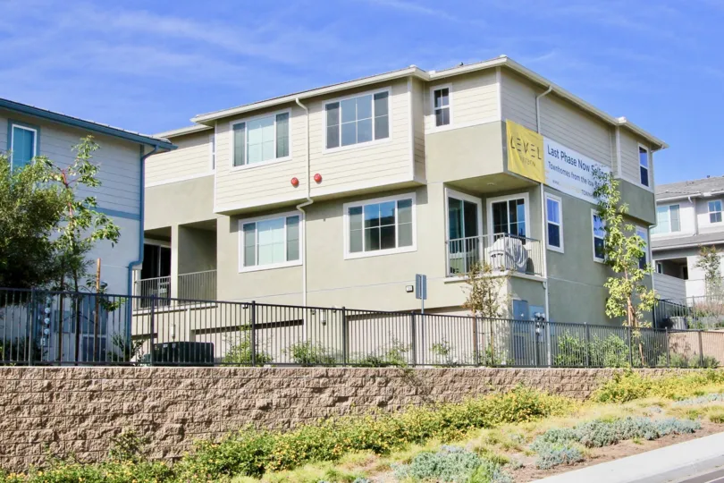 Level Fifteen are tan homes in Escondido, California.