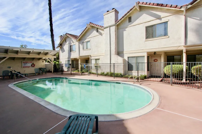 Swimming pool near residential buildings at Martin Court Gardens in Escondido California