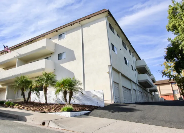 Three story condominium building with attached garages at Montecristo Villas South in Escondido California