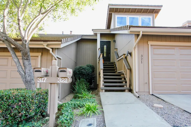 Residence with attached garage and stairway at Morningside Woods in Escondido California