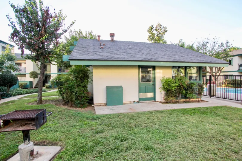 Small home in community with gated pool and barbeque out front, located in Pepperwood Meadows, Escondido, California.