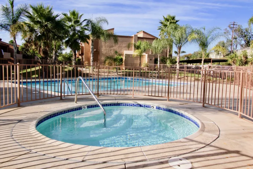 In Rock Springs East, Children and adults swimming pools are present inside with trees and plants