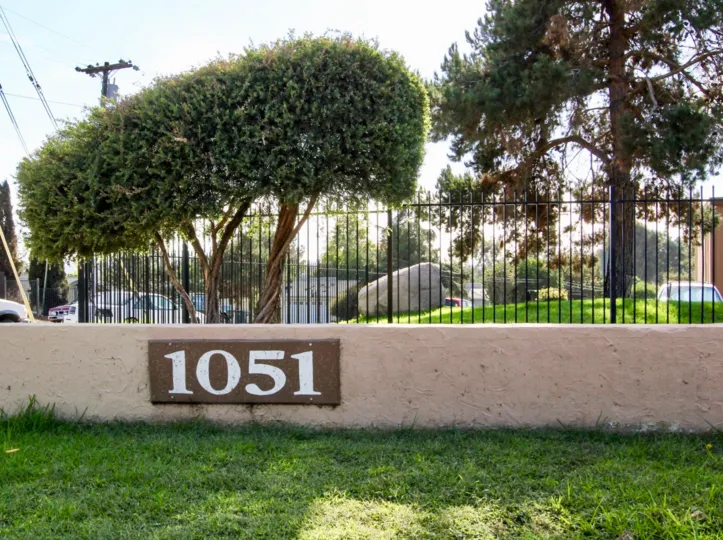 Rock Springs West community Escondido California fence trees grass landscaping  parking