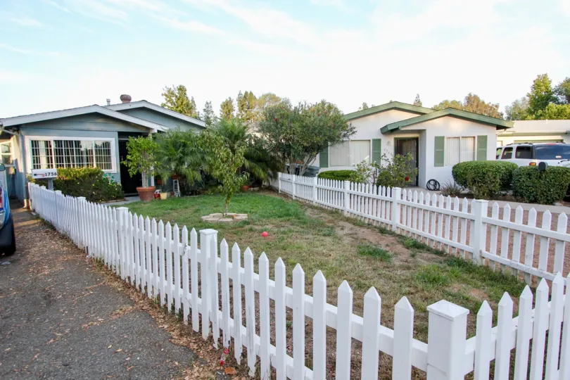 Front yard of home with driveway at Rosedale Manor in Escondido California