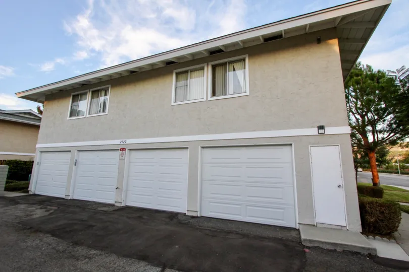 Two story residential building with attached garages at Shadow Mountain in Escondido California