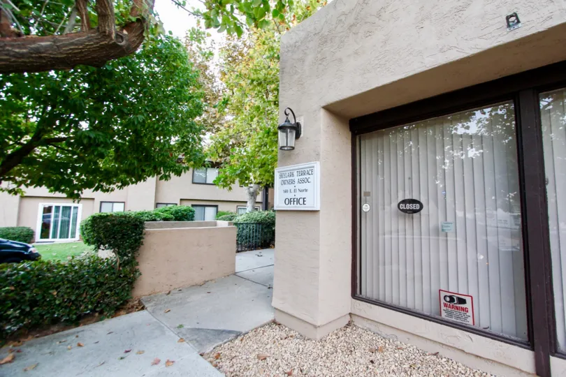 Management office next to a sidewalk at Skylark Terrace in Escondido California