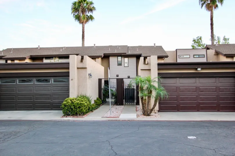Driveway next to garages and residential buildings at Skylark Terrace in Escondido California