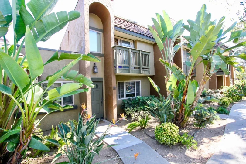 Two story residential units with lush green landscape at Sommerset Woods in Escondido California