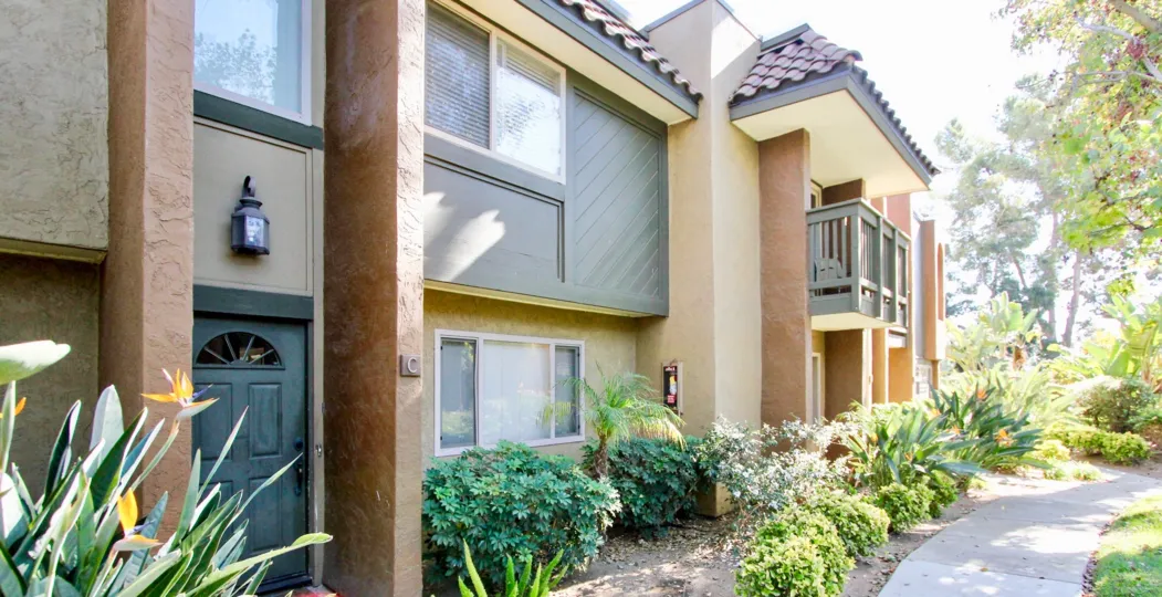 Picturesque view of apartments in Sommerset Woods from the sidewalk outside