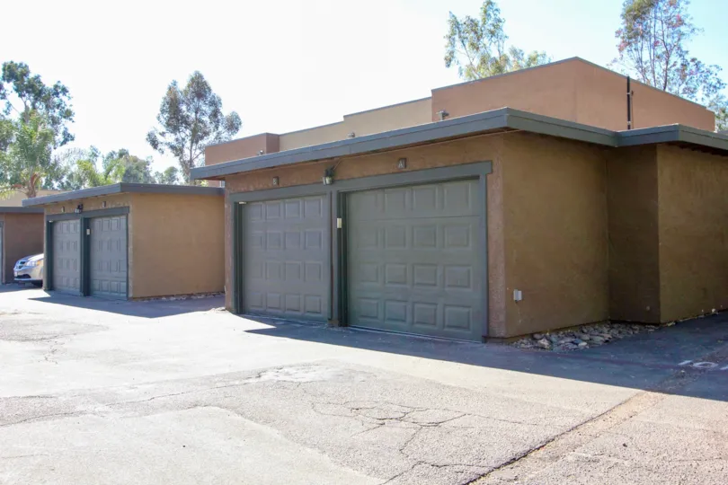 A couple of garages with gray doors in Sommerset Woods neighborhood