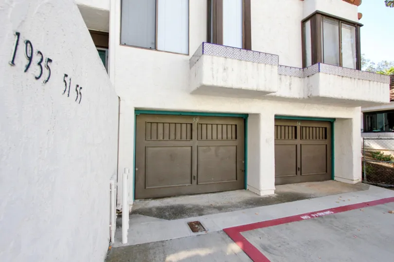The garage view of green lined garages in Sunset Woods Escondido ca