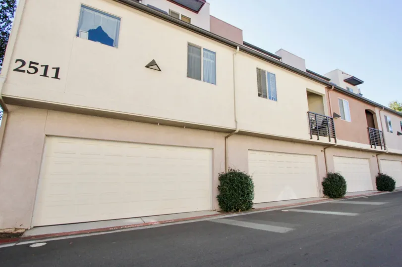 Two story residential buildings with attached garages at Urbana At Citracado Village in Escondido California