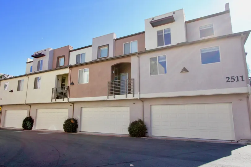 Three-story condos with separate garages, located in Urbana at Citracado Village, Escondido, California.