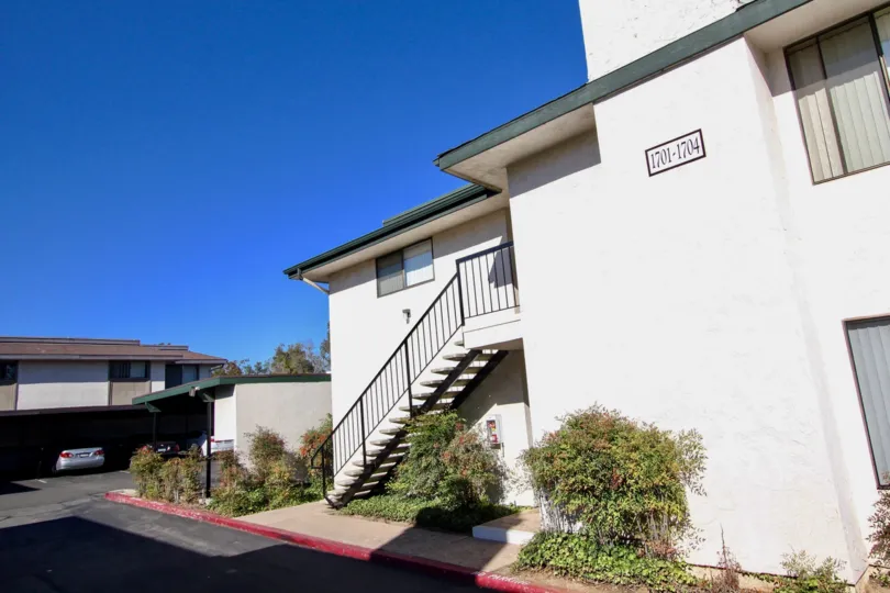 Two story housing structure near driveway at Vermont Villas in Escondido California