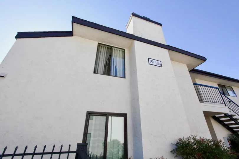 Top angle view of the building have plants in front side in Vermont Villas