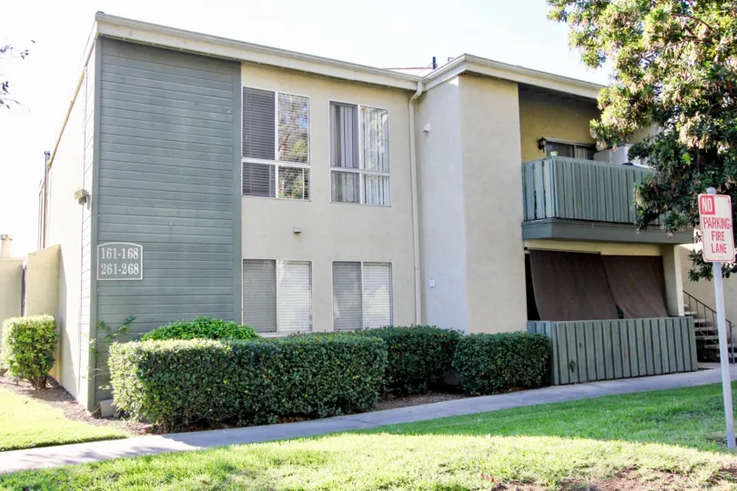 A Bright Sunny Day and beautiful green lawn in front of a House in Village Green Community of Escondido City
