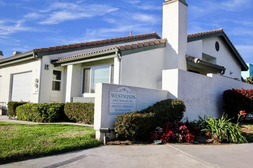 Entrance with sign near a residential unit at Westwinds I in Escondido California