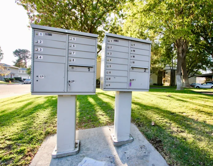 Community mailboxes located on a large plot of green space in White Oak Estates
