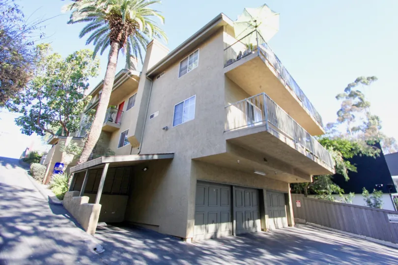 727 Robinson multi-story beige building with patios Hillcrest California