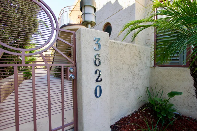 An entrance of a building in the Balboa Court with beautiful gate.