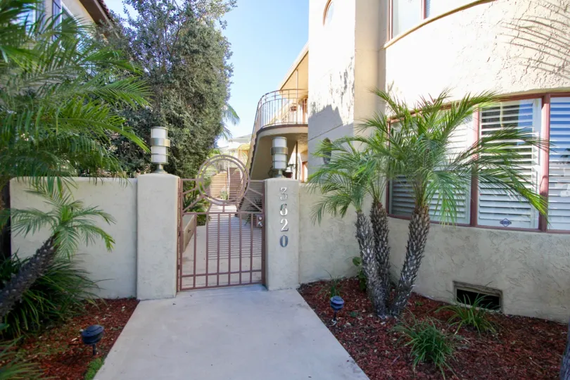 THE 3620 APARTMENT IN THE BALBOA COURT WITH THE TREES, PLANTS, UPSTAIRS