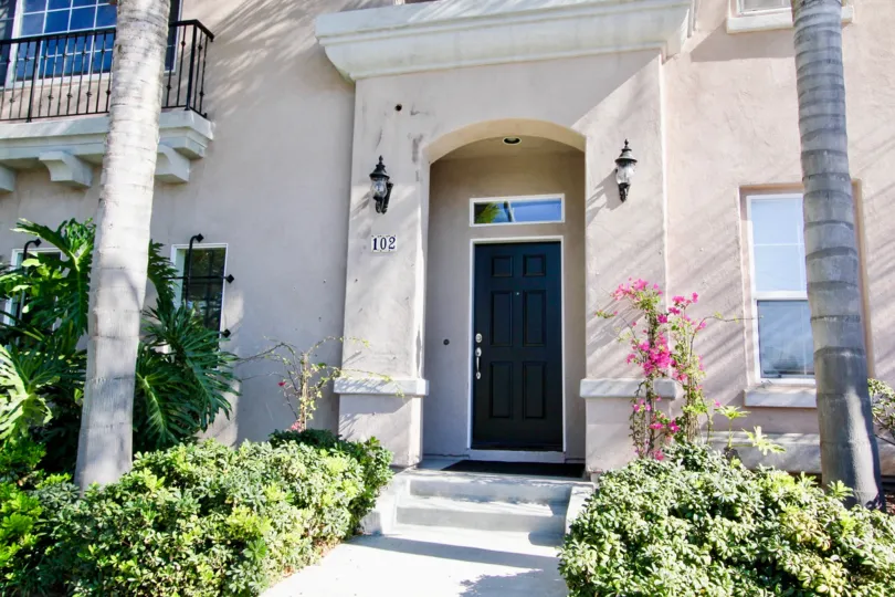 Beautiful front view of house with sunshine and garden around in Bristol Square of Hill Crest