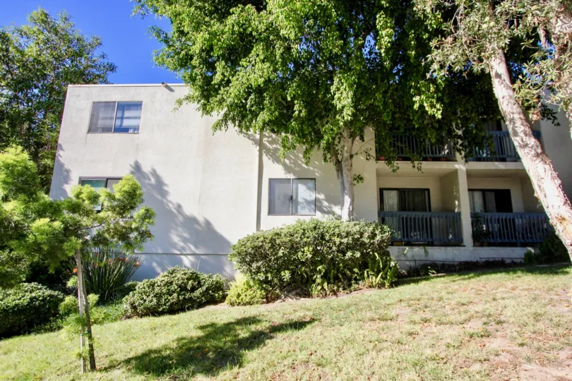 Canyon Shadows white two-story with patios Hillcrest California
