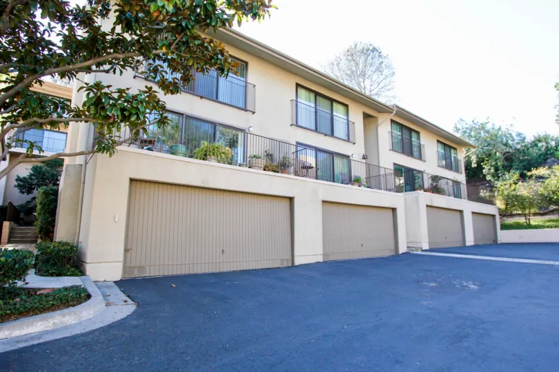 symmetrical housing with garage and parking on ground floor and living on above