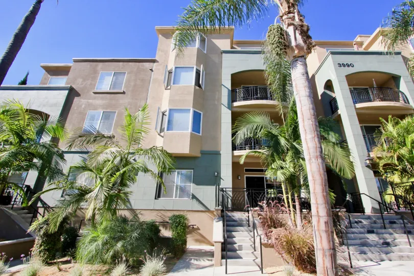 THE 3990 APARTMENT IN THE Centre Court Condominiums WITH THE UPSTAIRS, TREES, PLANTS, BALCONIS