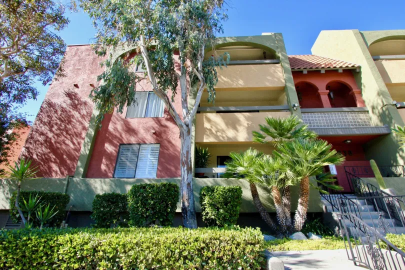 A multi-colored three-storey residence in the Centre Park Terrace community.