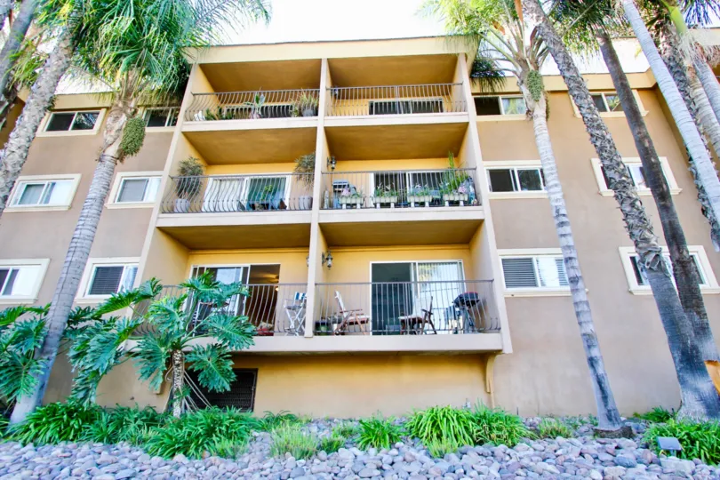 Balcony in Apartment of Cliffbridge Estates full of flower pots and chairs