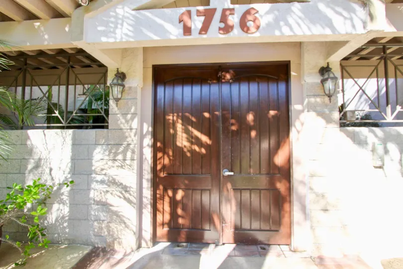 The number 1756 mentioned above the door and has light lamps attached on both sides