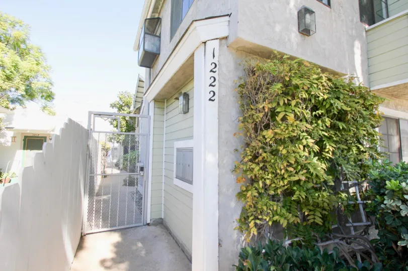 THE 1222 APARTMENT IN THE ESSEX STREET CONDOS WITH THE PLANTS, TREES